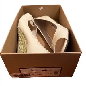 Cole Haan Nike Air patent leather open-toed shoes with sisal wedge heel.